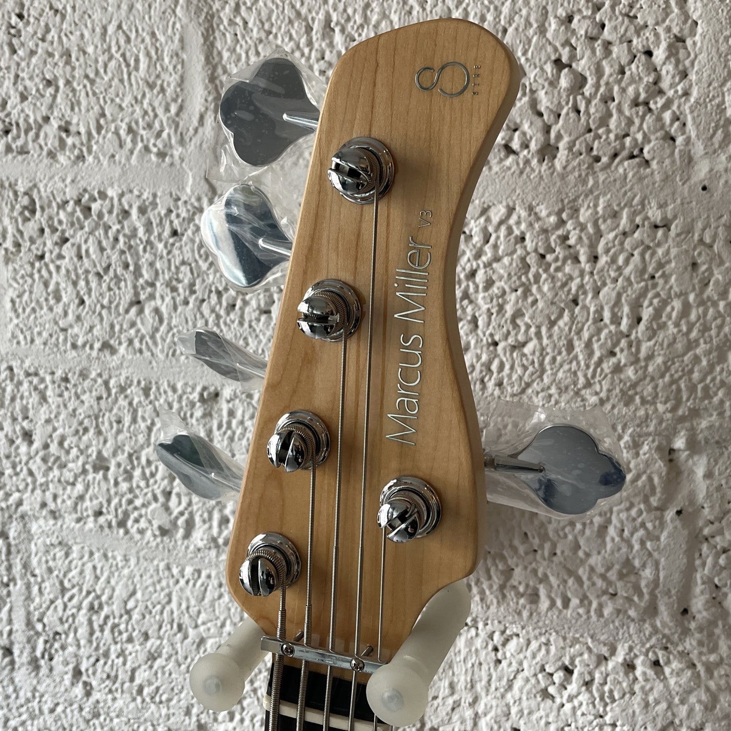 sire marcus miller v3+5 5-string mahogany electric bass headstock
