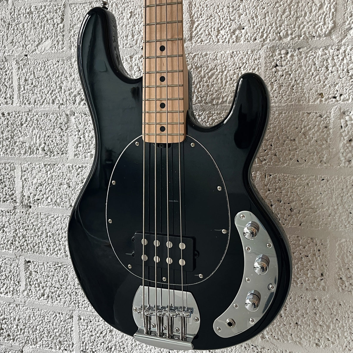 sterling by music man sub series stingray ray4 black body closeup angled right