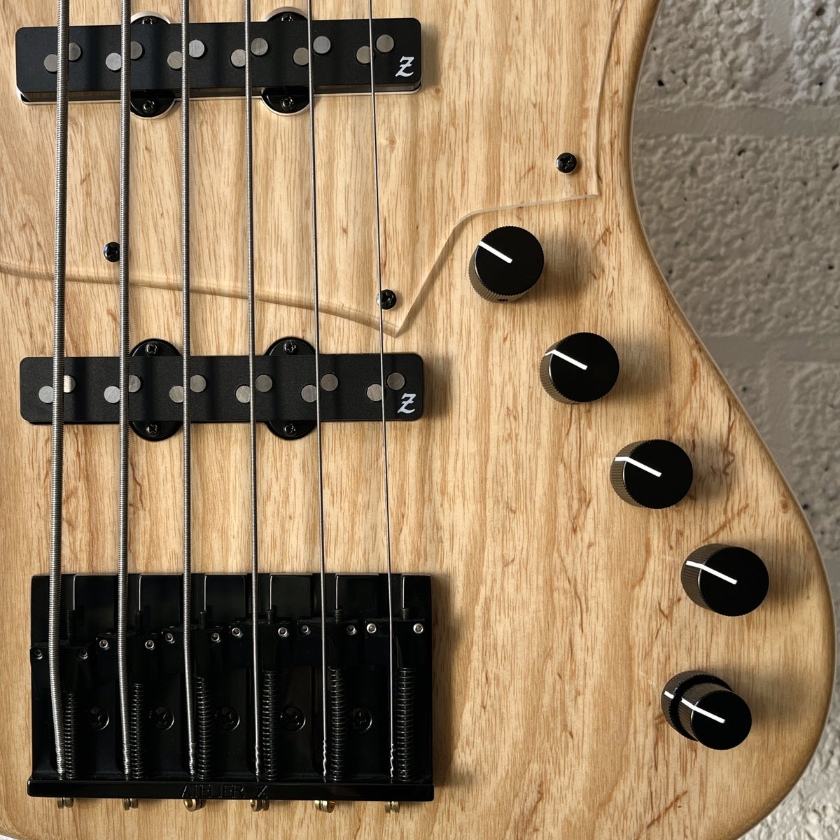 Atelier Z Beta6 6-string bass in Natural finish with black hardware pickups controls bridge