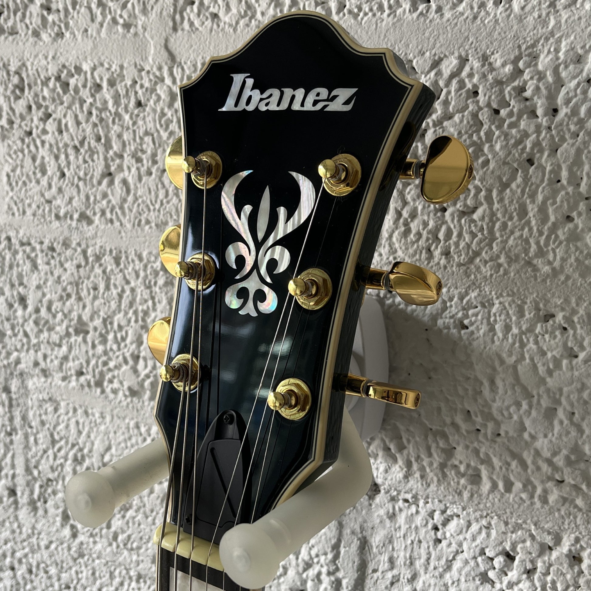 ibanez as93fm transparent moss green semi-hollow electric guitar headstock