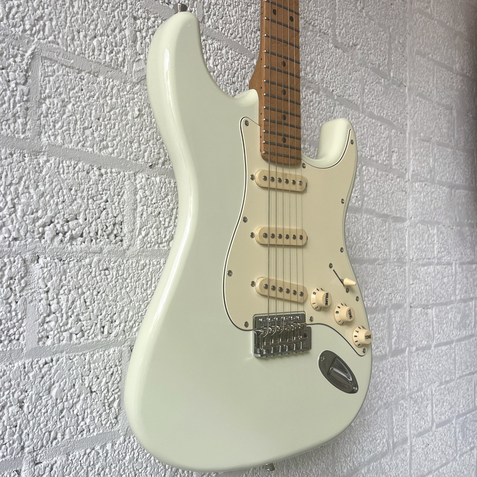 jet js300 electric guitar white body closeup angled view left