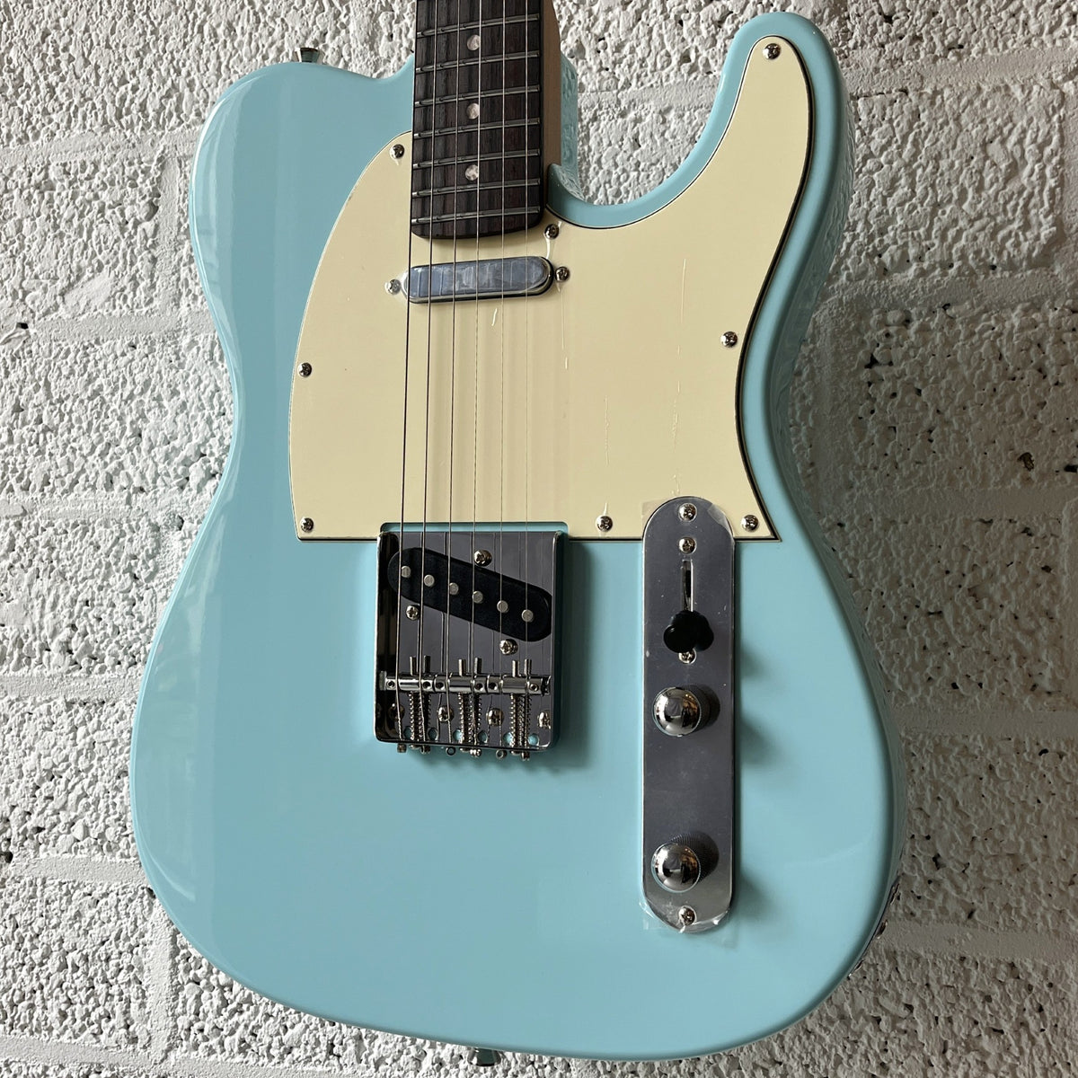 jet jt300 electric guitar blue rosewood fingerboard body closeup angled right