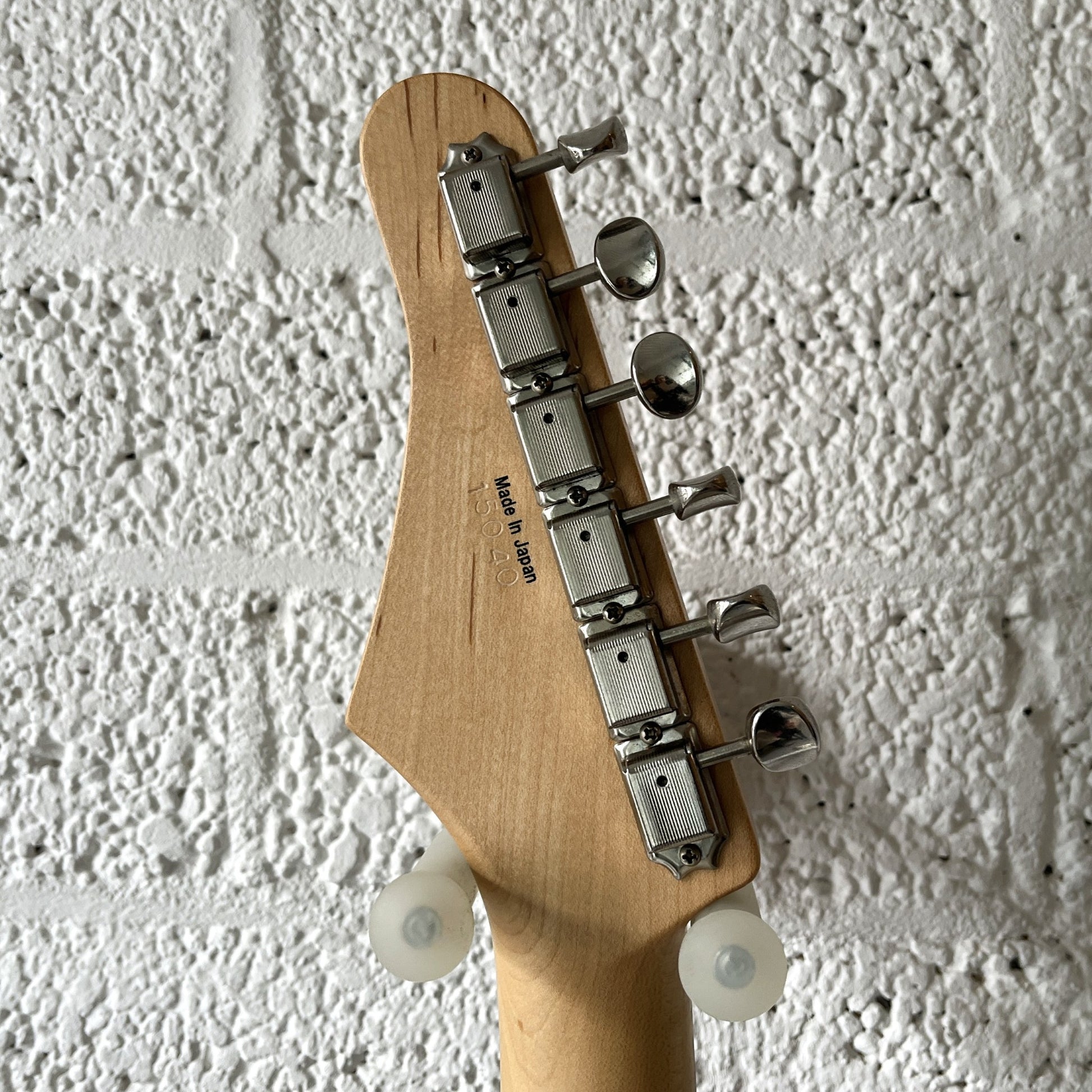 kaminari liquid electric guitar metallic white burst headstock back