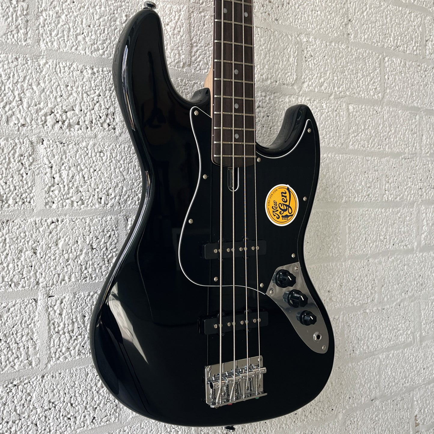 sire marcus miller v1 electric bass black angled right