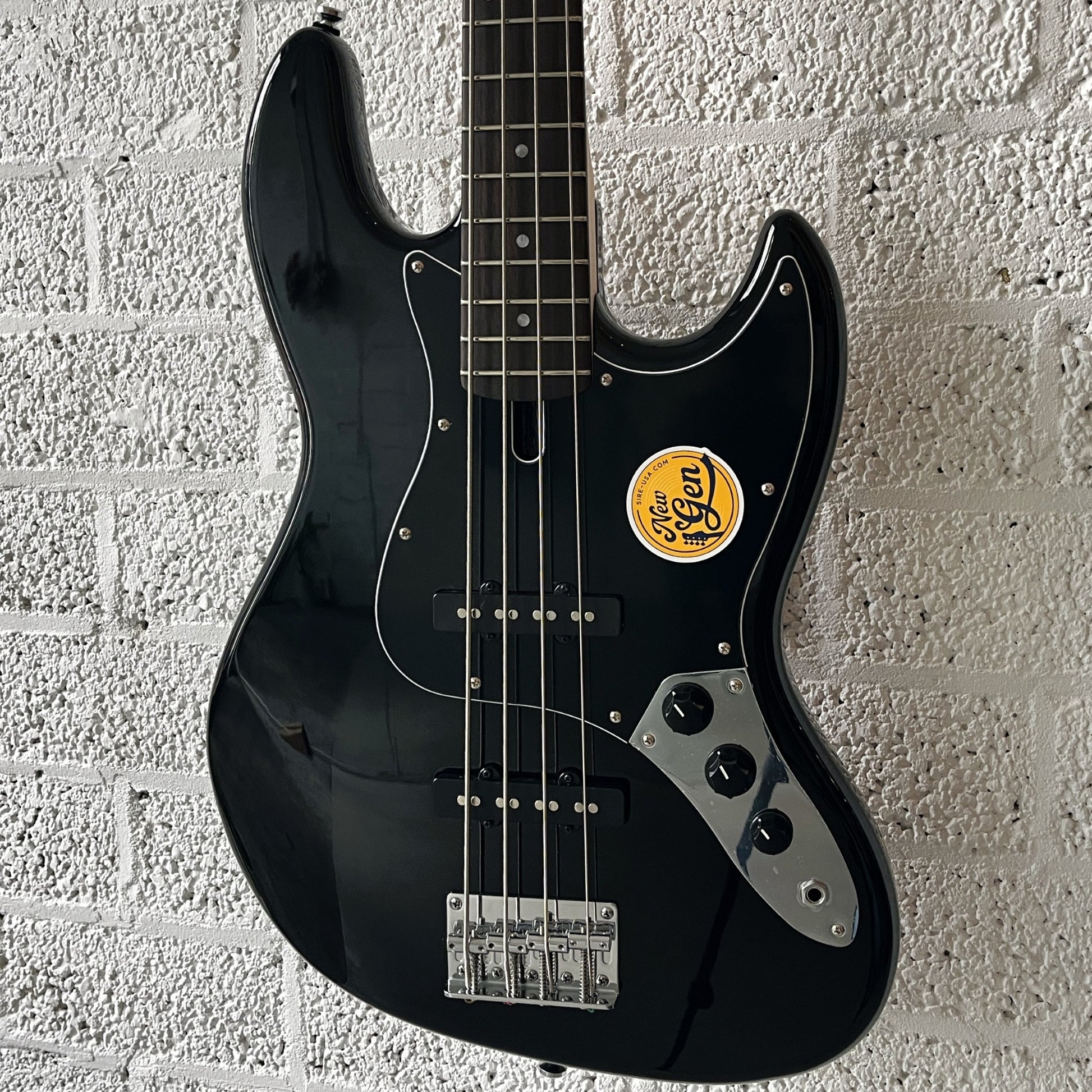 sire marcus miller v1 electric bass black body closeup