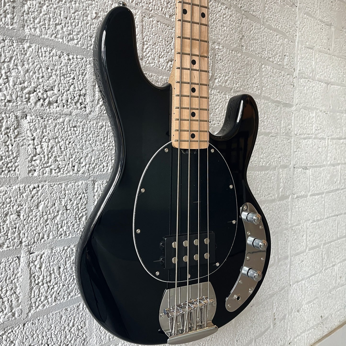 sterling by music man sub series stingray ray4 black body closeup angled left