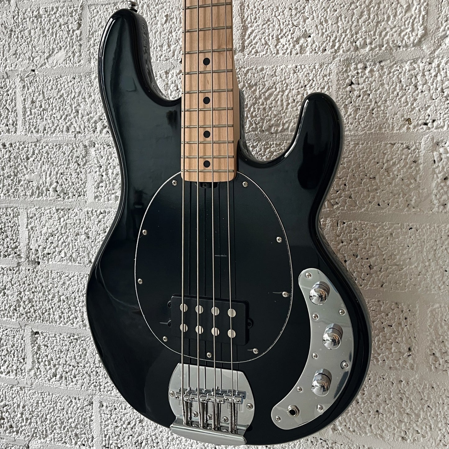sterling by music man sub series stingray ray4 black body closeup angled right